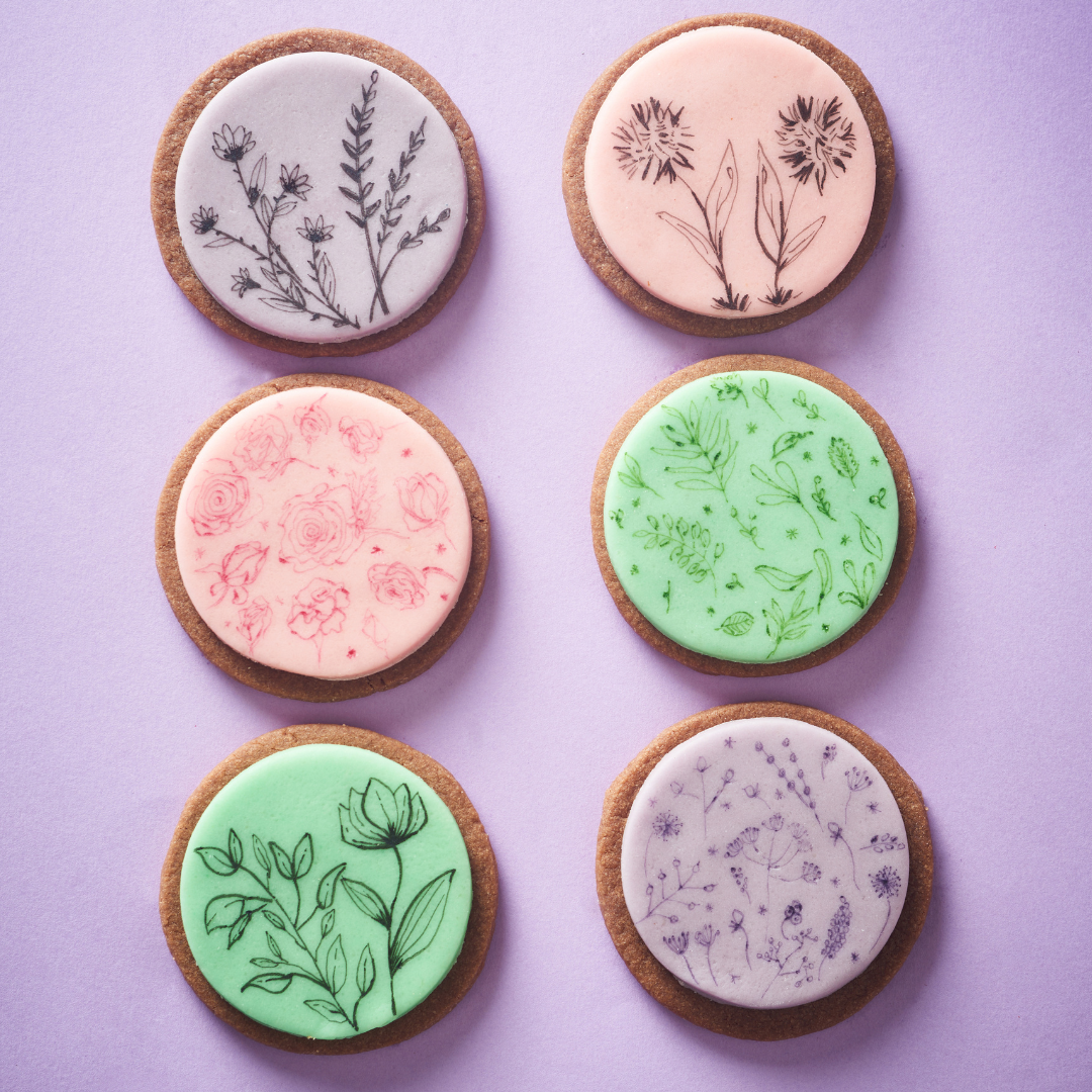 Royal icing biscuits with food colouring pen drawing decoration