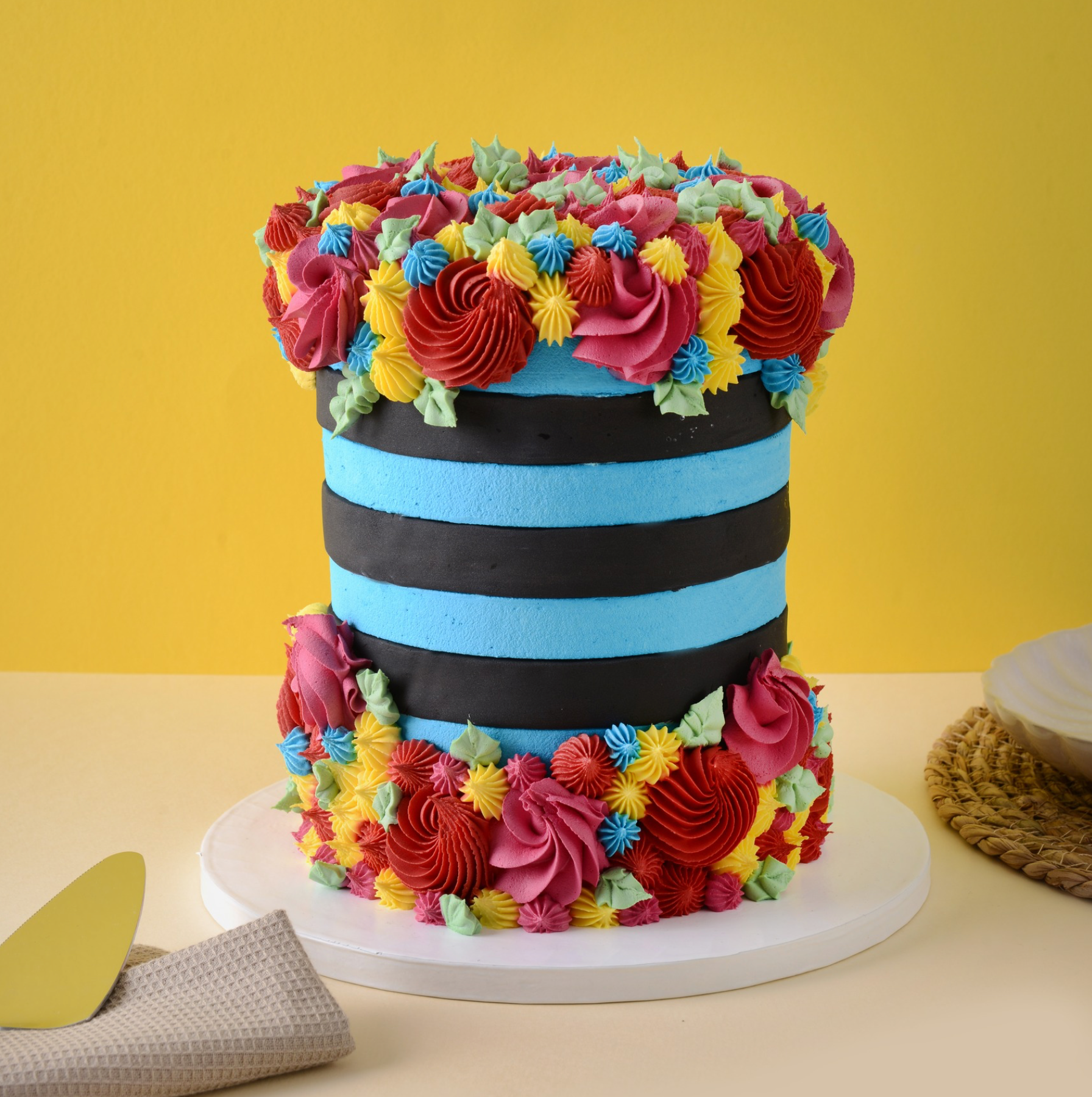 Black and blue striped cake icing decoration