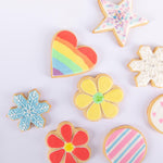 Coloured royal icing on biscuits